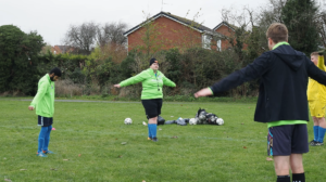 POV Shot of Sileby United coach conducting her warm up.